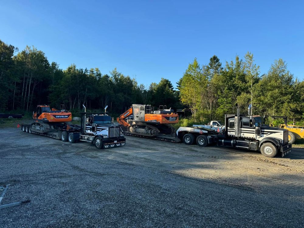 Safe, reliable heavy-equipment hauling with modern lowbeds and experienced operators to move your machinery efficiently. for Gardner Road Company in Winn, ME