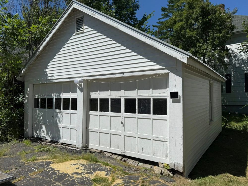 Enhance your home's value and functionality with our expert garage construction service, offering custom designs, durable materials, and precise craftsmanship to seamlessly integrate with your existing roofing structure. for Maine Roofing and Siding in Richmond, ME
