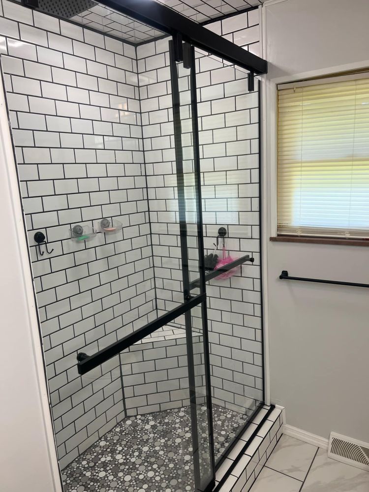 Transform your bathroom into a modern oasis with our expert remodeling services. We provide personalized designs, quality craftsmanship, and efficient installation to enhance both functionality and style in your home. for J&H General Contracting LLC in Williamsburg, KY