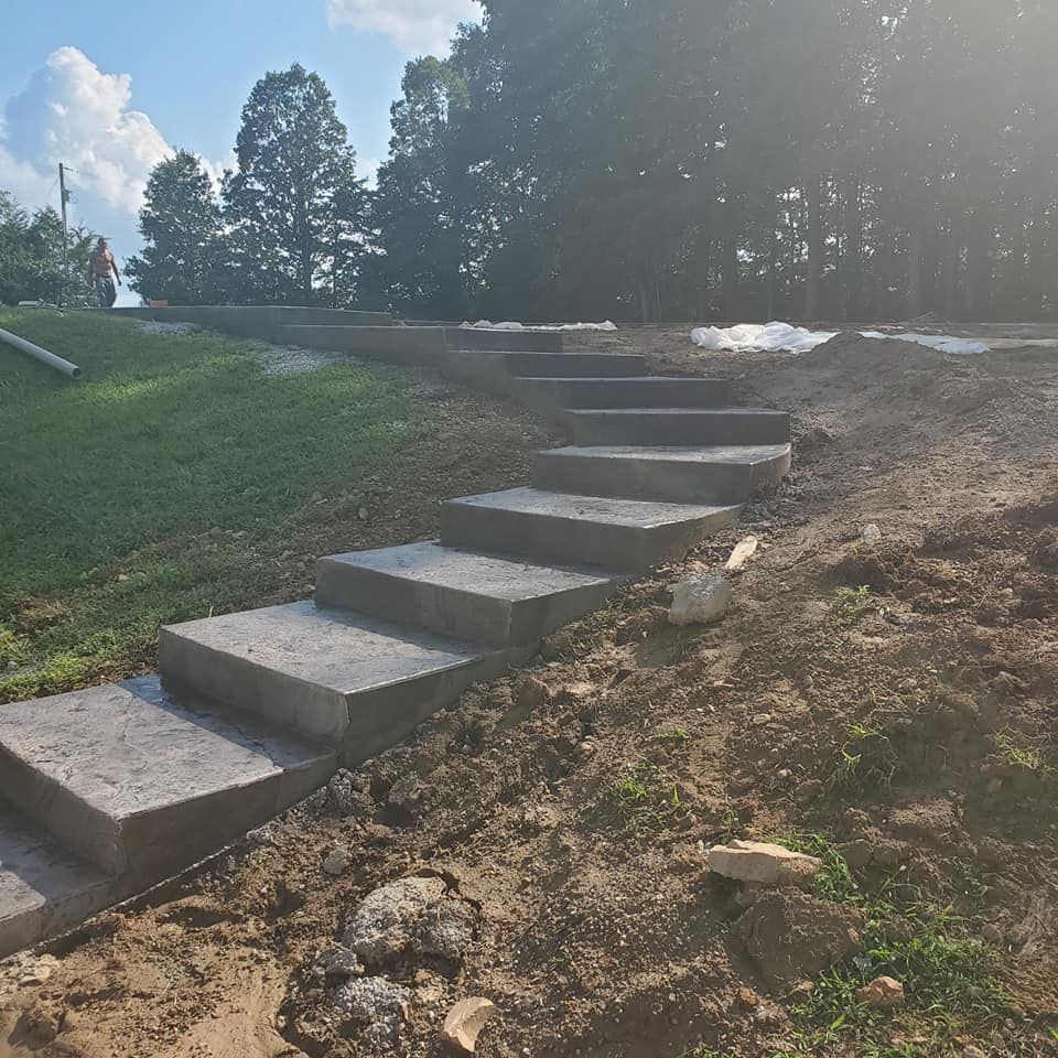 Our Stair Design & Installation service offers homeowners the opportunity to enhance their property with durable and stylish concrete stairs, expertly crafted to elevate the aesthetics and functionality of their home. for Sullivan Concrete in Kingston Springs, TN