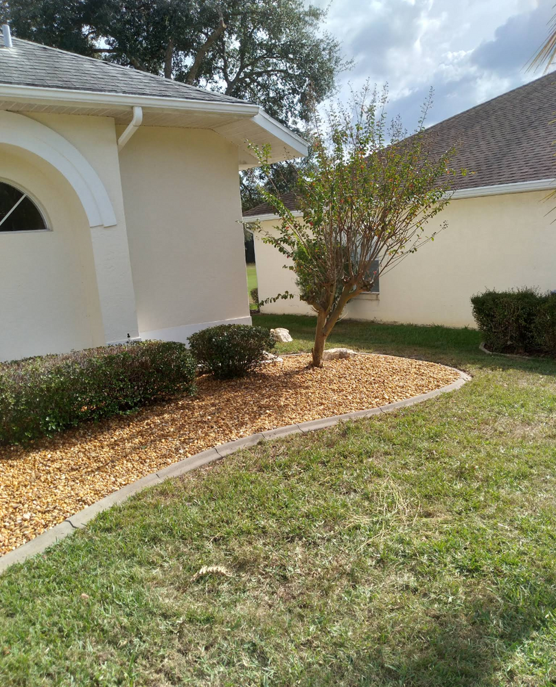 Enhance your landscape with our professional mulch installation service, designed to retain soil moisture, suppress weeds, and improve the health of your plants while adding aesthetic appeal to your yard. for Perfect Cut Lawn & Tree Care in Citrus Springs, FL