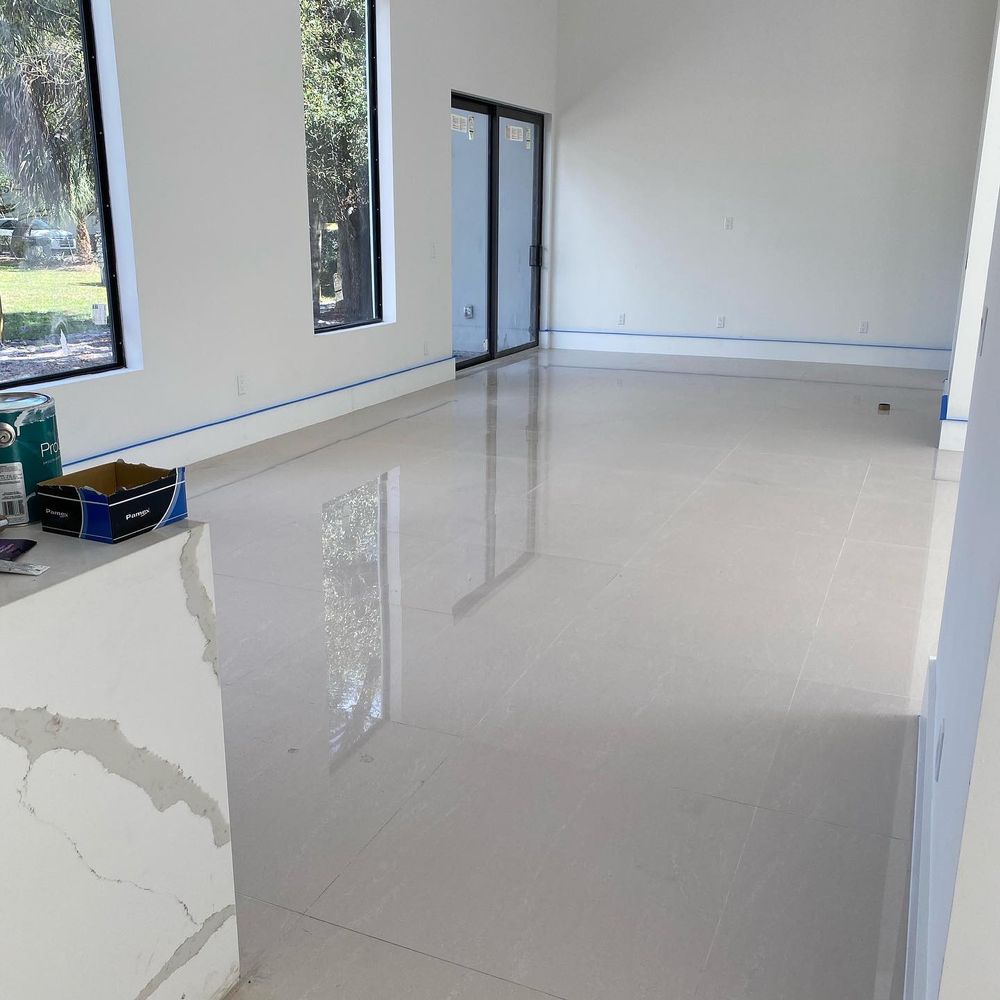 Our Epoxy Floor Coating service transforms your floors with a durable, glossy finish that’s easy to maintain. Enhance your home's appeal and resilience with our expert application methods. for Brothers Painting in West Palm Beach, FL