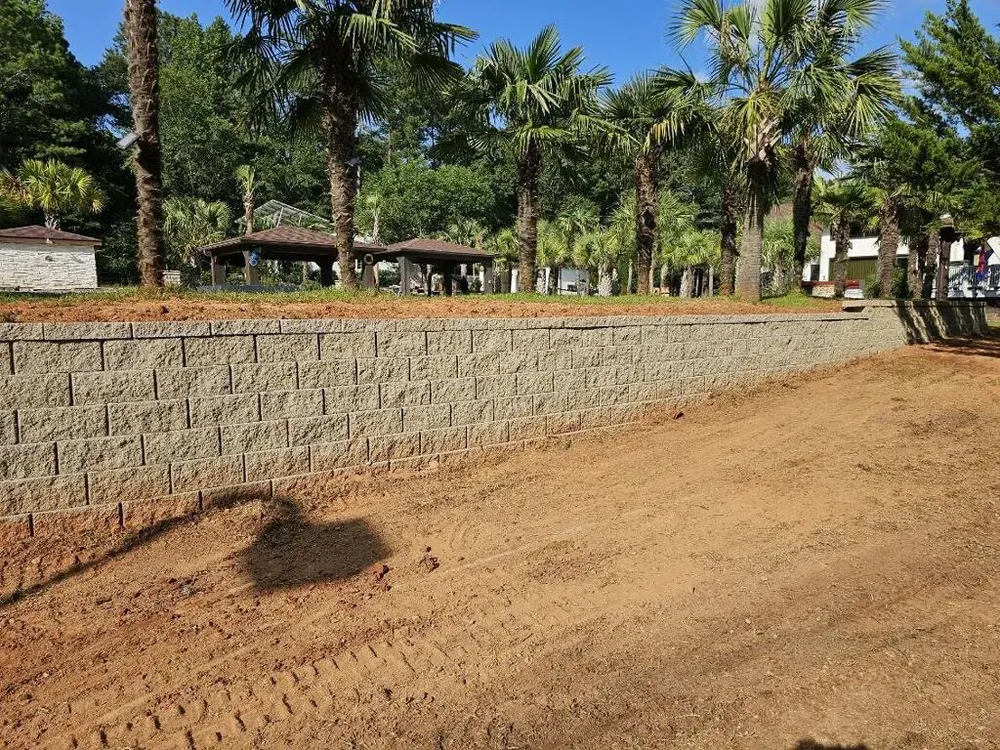 Our Retaining Wall Construction service provides durable, aesthetically pleasing walls that prevent soil erosion, maximize usable space, and enhance the landscape's beauty while ensuring structural integrity for your outdoor living areas. for Kieran's Hardscaping in Providence, RI