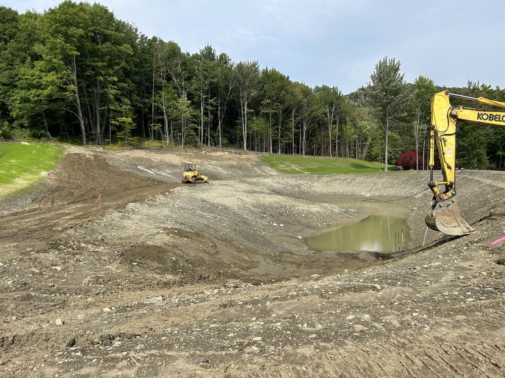 Carving a Pond into a Mountain Side for Andy Naylor Excavation in Johnson, VT