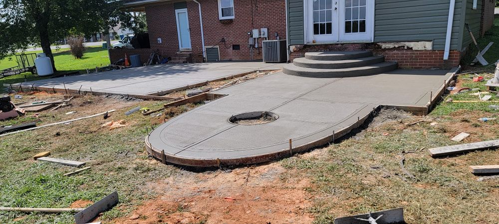 Transform your outdoor space with our expert hardscaping services. We offer precision concrete pumping to create beautiful, durable patios, walkways, and retaining walls that enhance functionality and aesthetic appeal for your home. for JD Hardscapes & Landscaping LLC in Shelby, NC