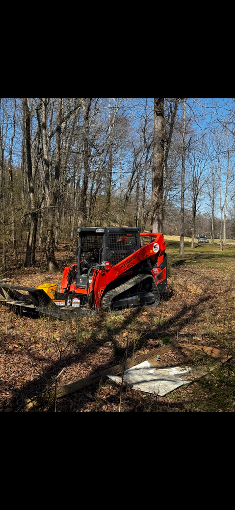 Our Forestry Mulching service efficiently clears overgrown vegetation using eco-friendly techniques, enhancing land beauty and usability while preserving soil health, perfect for homeowners looking to improve their property’s landscape sustainably. for Leal’s Lawn Service and Excavation in Dayton, TN