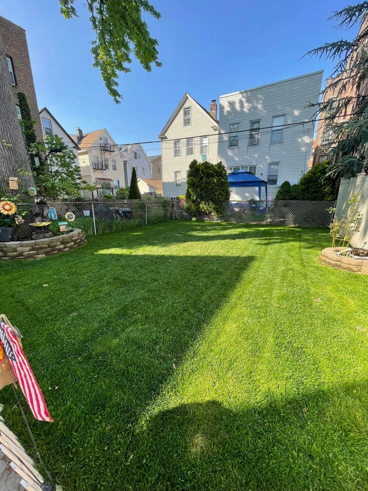 Our professional mowing service ensures your lawn is consistently maintained to look its best year-round, saving you time and effort so you can enjoy a beautifully manicured outdoor space. for Next Level Landscaping & Construction in Bayonne, NJ