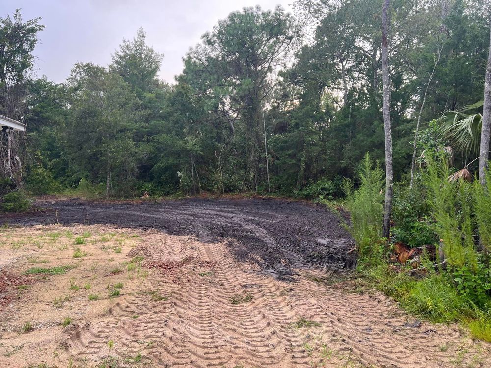 Our Land Grading service ensures your property's foundation is level, preventing water pooling and structural issues. Trust us to create a smooth and stable surface for your outdoor projects. for All American Excavating Inc in Brooksville,  FL