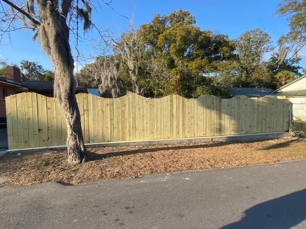 Enhance your property's security and aesthetics with our expert fencing service, offering customized designs, durable materials, and professional installation to perfectly complement your landscape while providing privacy and peace of mind. for Santos Landscape in Waycross, GA