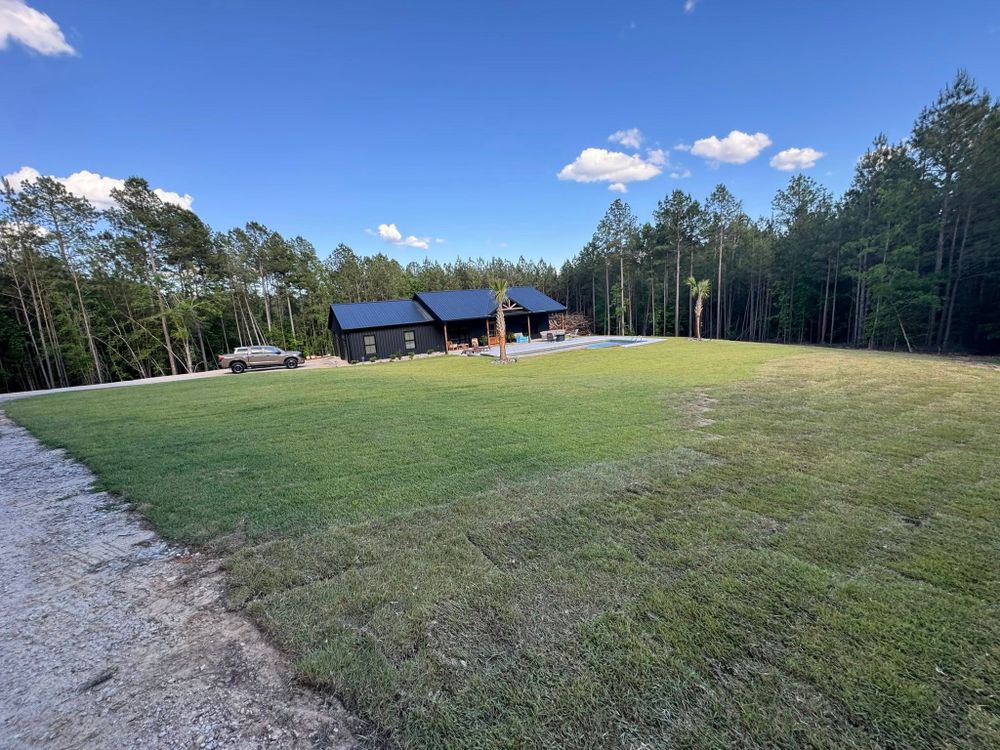 Enhance your lawn's health and vibrancy with our expertly tailored fertilization service, designed to provide essential nutrients for robust growth and luscious greenery, ensuring a thriving outdoor space year-round. for Trophy Outdoor Solutions in Lexington, SC