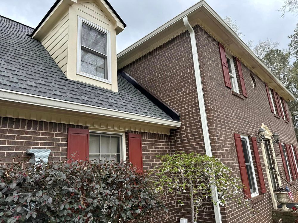 Ensure your home is protected from water damage by taking advantage of our professional Gutter Cleaning service. Keep your gutters clear to maintain the longevity and functionality of your fencing investment. for A&C Roofing Specialist in Fayetteville, Georgia