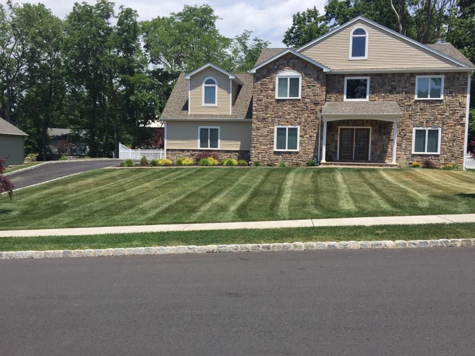 Enhance your lawn's health and vitality with our professional aeration service, relieving soil compaction, improving water absorption, and promoting stronger root growth for a lush, green yard. experience healthier turf today! for Sanchez Home Services in Pompton Lakes, NJ