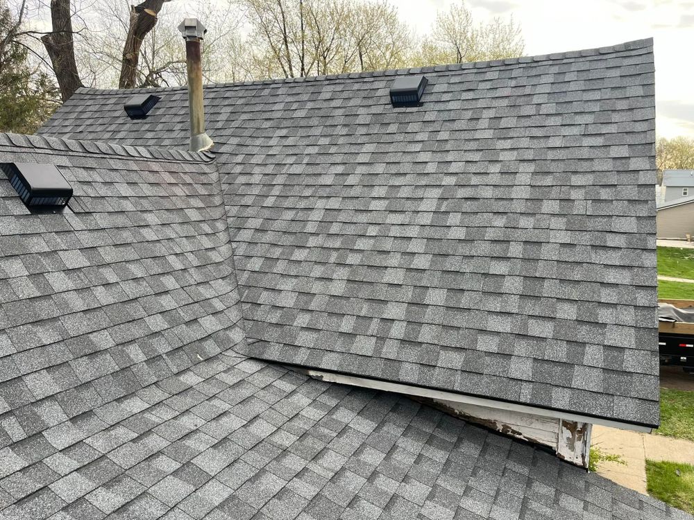 Our expert team provides top-quality asphalt shingle roofing replacement, ensuring durability, energy efficiency, and enhanced curb appeal for your home. Trust us for a seamless installation experience and long-lasting protection. for Harnack Builders & Roofing in Beaver Creek, MN