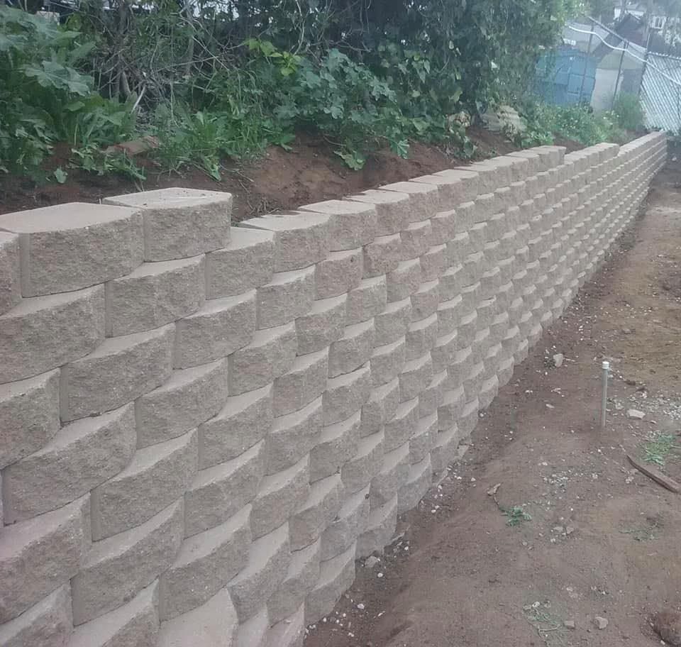 Our Retaining Wall Construction service enhances your landscape's functionality and beauty, providing durable stability to prevent soil erosion while adding aesthetic value with expert craftsmanship tailored to complement your home's design. for B&D Masonry in San Diego, CA