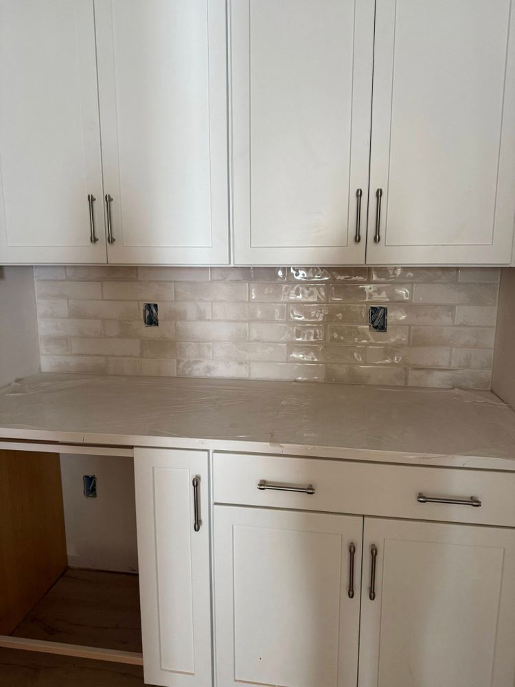 Our expert tiling services transform your kitchen with stylish, durable backsplash solutions, enhancing both functionality and aesthetics to create a beautiful focal point in the heart of your home. for Dr J Flooring Llc in Greenville, South Carolina