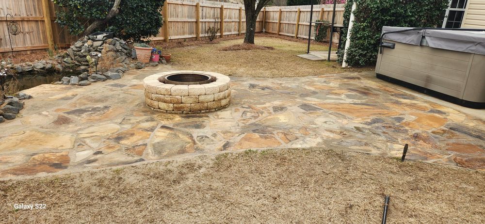 Enhance your outdoor living space with our expert Patio Design & Construction service, creating seamless, stylish, and durable patios tailored to your home's aesthetic and functional needs. Enjoy personalized solutions for ultimate relaxation. for Velsain Landscapes in Warner Robins, GA