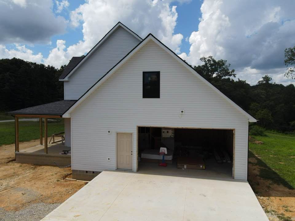 Enhance your home's exterior with our expert siding services, offering durable materials and superior craftsmanship to protect and beautify your home while increasing energy efficiency and boosting curb appeal. for J&H General Contracting LLC in Williamsburg, KY