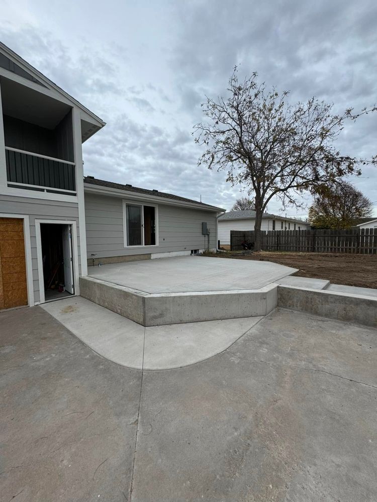 Discover what concrete is with our reliable service, providing homeowners durable and versatile solutions for driveways, patios, and foundations that ensure strength and longevity in every construction or remodeling project. for Jag Of All Trades Construction in Hays, KS