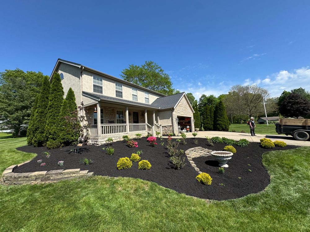 Our professional mulch installation service provides a protective layer for your landscape, helping to retain moisture, suppress weeds, and enhance the overall aesthetic appeal of your property. Contact us today! for Dewhurst Landscaping & Lawncare in Pickerington, OH