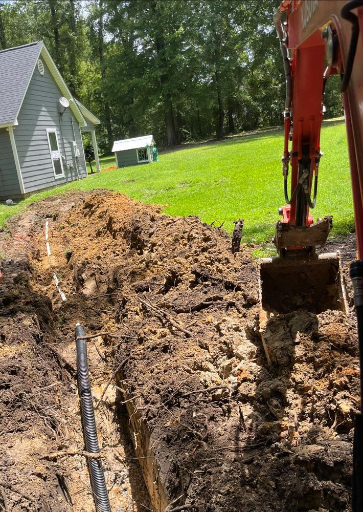 Discover the true excavation meaning with our service, expertly preparing your landscape for transformation by clearing land and creating a solid foundation for your landscaping or hardscaping projects. for Landscaping Pros in Hurley, MS