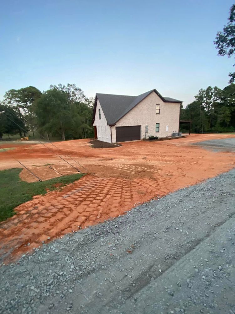 Our House Pads service provides durable, weather-resistant mats to protect your driveway and yard from potential damage caused by dumpsters, ensuring your property remains in pristine condition during waste removal. for Daniel's Dumpsters & Land Improvements in Monroe, LA