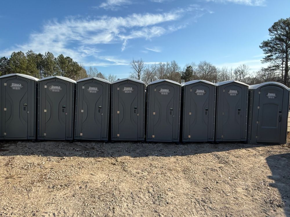 Explore our range of portable restroom solutions: versatile construction units, special event setups, boudoir and handicap-accessible options, all with sinks. Our 3-stall trailers offer convenience with fresh water and holding tanks. for Drano's Site Services in Chester, SC