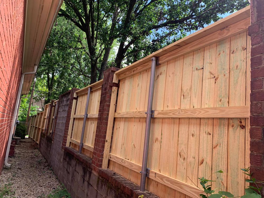 Our professional fence installation service enhances your property's security and aesthetic appeal with high-quality, durable materials. Trust our experienced team to expertly transform your outdoor space with precision and care. for PKJ Construction LLC in Bartlett, TN