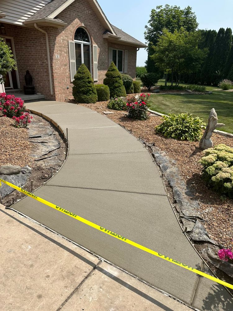 Our concrete services provide durable, high-quality solutions for driveways, patios, and sidewalks. With professional installation and a focus on customer satisfaction, we ensure lasting beauty and functionality for your home's exterior landscape. for Donahue Concrete in Streator, IL
