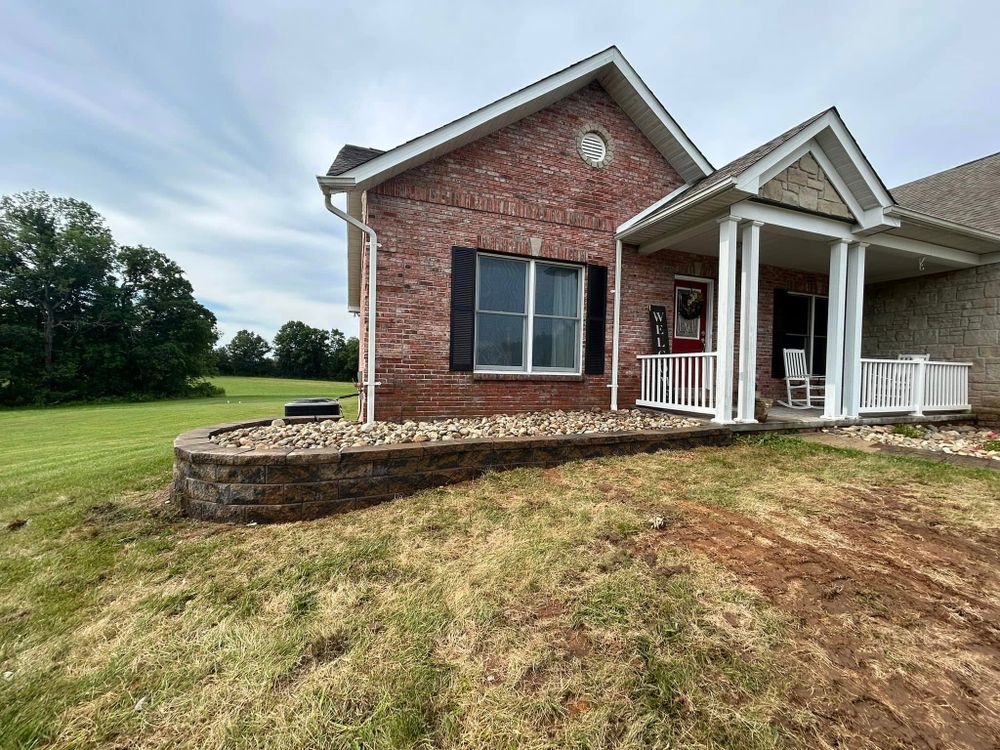 Our Retaining Wall Construction service provides expert installation of durable and visually appealing walls to enhance the functionality and aesthetics of your outdoor space, ensuring long-lasting support for sloped terrain. for Basler Outdoor Services, LLC in Farmington ,  MO