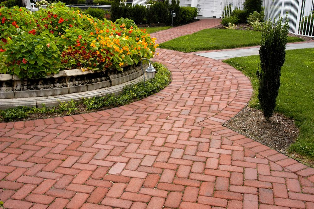 Transform your outdoor space with our expert concrete pavers service, offering durable and aesthetically pleasing solutions to enhance your home's curb appeal and create functional, beautiful patios or walkways. for Scalco’s Land Services in Statesboro, GA