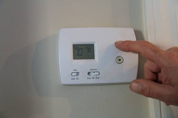 Our Thermostat Installation and Programming service ensures optimal comfort by expertly setting up your system for efficiency and convenience, helping you manage energy usage while maintaining perfect home temperatures year-round. for Choy Heating & Cooling in Jersey City, NJ