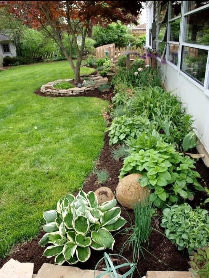 Enhance your garden's health and aesthetics with our professional mulch installation service, which helps retain moisture, suppress weeds, and enrich soil, ensuring vibrant and thriving plants year-round. for All Tree Property Services in Charlotte, NC