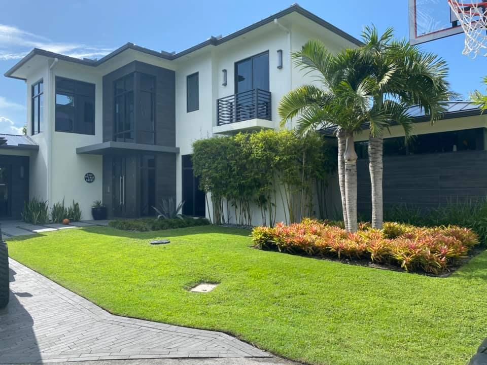 Transform your outdoor space with our expert Landscape Design services, combining creativity and functionality to create a personalized oasis that enhances your home's beauty and increases its value. for An Extravagant Landscape & Lawn Service in Delray, FL