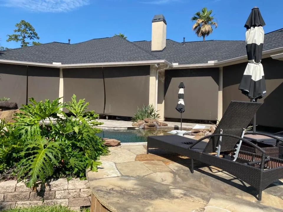 Our Outdoor Shades service provides homeowners with stylish and practical solutions for enhancing their outdoor living spaces by providing shade, privacy, and protection from the elements. Enjoy unparalleled comfort outdoors. for Deluxe Window Solutions in Houston, TX