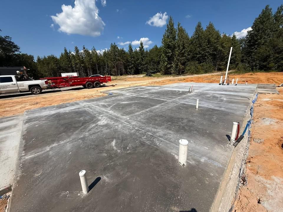 Our Foundation Pouring service ensures precise, durable construction for your home. Trust us to lay the foundations with expertise, providing stability and strength essential for any successful building project. for DH Construction & Concrete in Roebuck, SC
