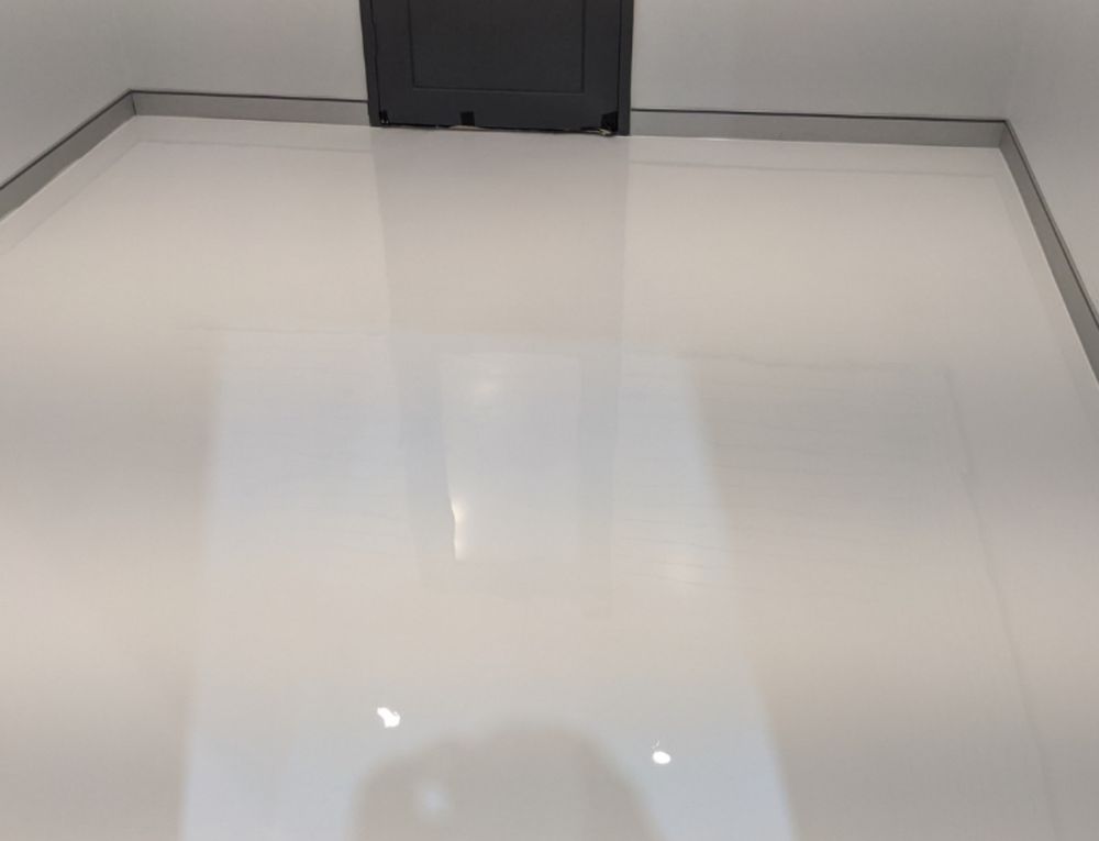 Transform your home's flooring with our Solid Color System Epoxy, offering a seamless, durable finish that's easy to maintain and available in various vibrant colors to suit any style. for Imperial Wood & Epoxy Flooring in Houston, TX
