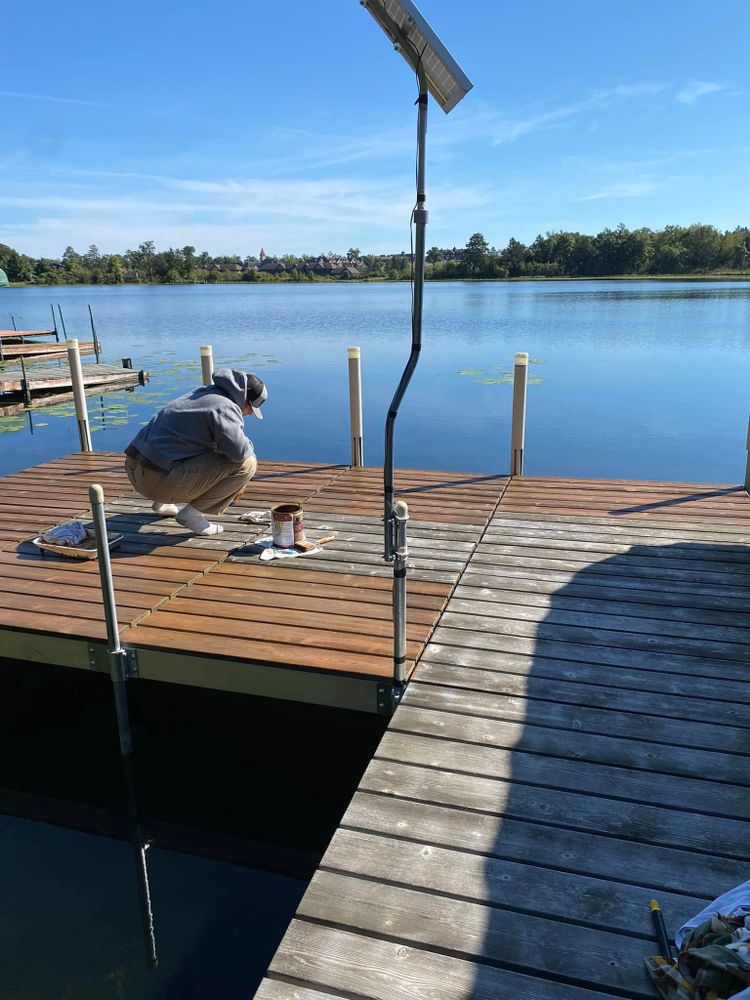 Enhance your outdoor space with our professional Dock & Deck Staining service, providing durable protection and a refreshed appearance to extend the life of your wooden structures while elevating their beauty. for JT’s Underwater Landscaping in Brainerd, MN