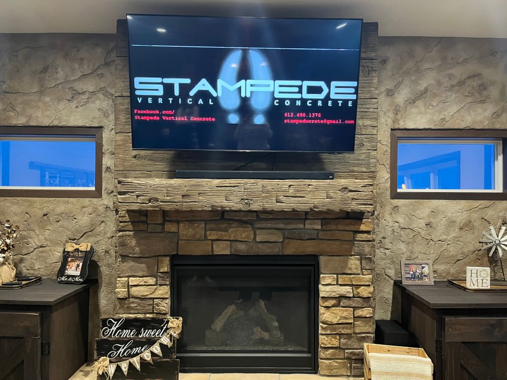 Interior fireplace & feature walls  for STAMPEDE Vertical Concrete in Isanti, Minnesota