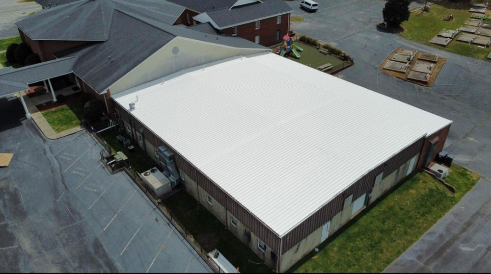 Our Metal Roof Restoration System is designed to renew and protect your existing metal roof, enhancing its lifespan and energy efficiency while saving you money compared to a full replacement. for Hyper Roofing LLC in Loxley, AL