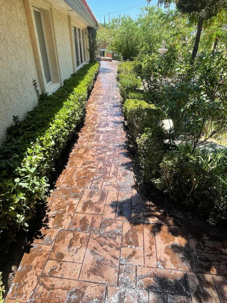 Our Stamped Concrete service offers homeowners the opportunity to enhance their outdoor spaces with beautiful and durable concrete designs, adding both value and aesthetic appeal to their properties. for Oasis Landscaping LLC  in El Paso, TX