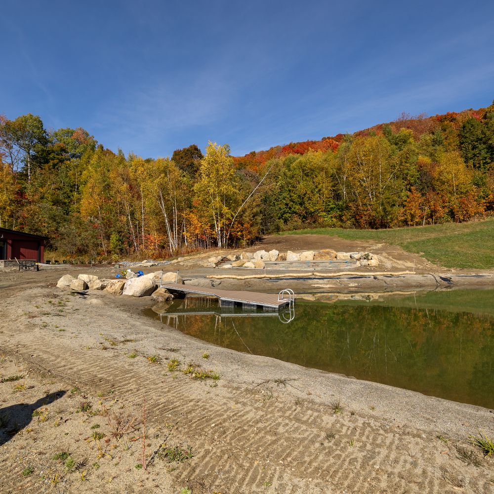 Carving a Pond into a Mountain Side for Andy Naylor Excavation in Stowe, VT