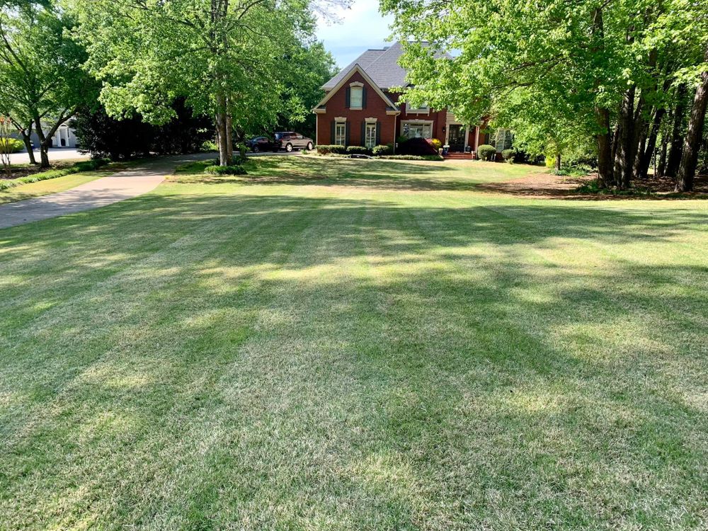 Our mowing service is the perfect way to keep your lawn looking its best. We offer weekly or bi-weekly service, and we can customize a plan that fits your needs. for GA Supreme Landscaping in Smyrna, GA