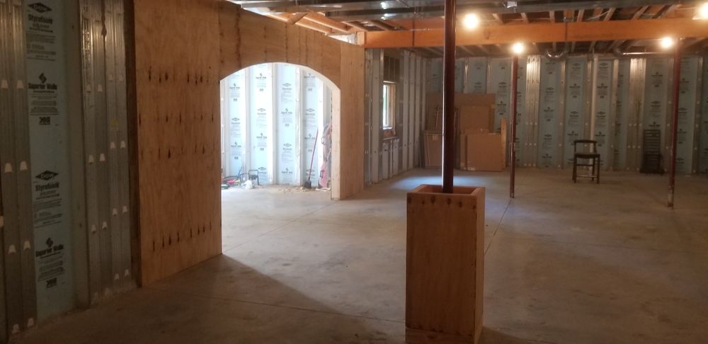 Transform your basement into a functional living space with our basement buildout service. We specialize in comprehensive renovations, including expert flooring installation, to enhance your home's comfort and value. for Cottage Services of Northern Michigan LLC in Antrim County, MI