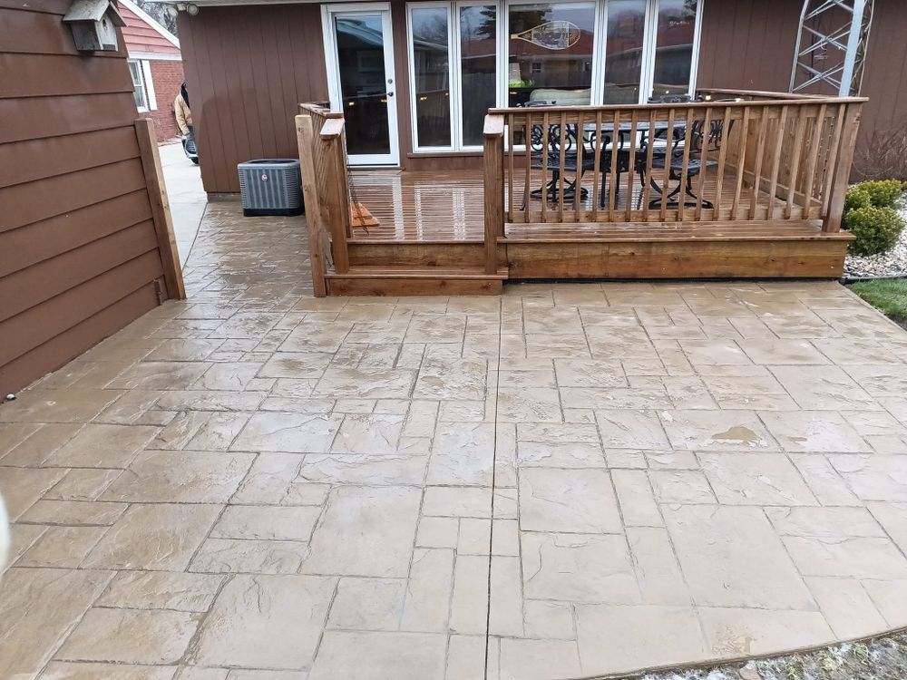 Our concrete stamping service transforms plain surfaces into elegant, durable patios, walkways, and driveways with realistic patterns and textures that enhance curb appeal while providing long-lasting beauty and value. for O&M Concrete in Racine, WI