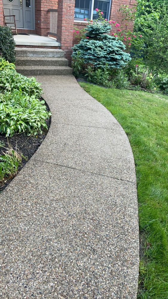 Revitalize your home's exterior with our professional pressure washing service, effectively removing dirt, grime, and stains from driveways and walkways for a pristine finish that enhances curb appeal. for Amick’s Affordable Concrete & Power Washing LLC in Mansfield, OH