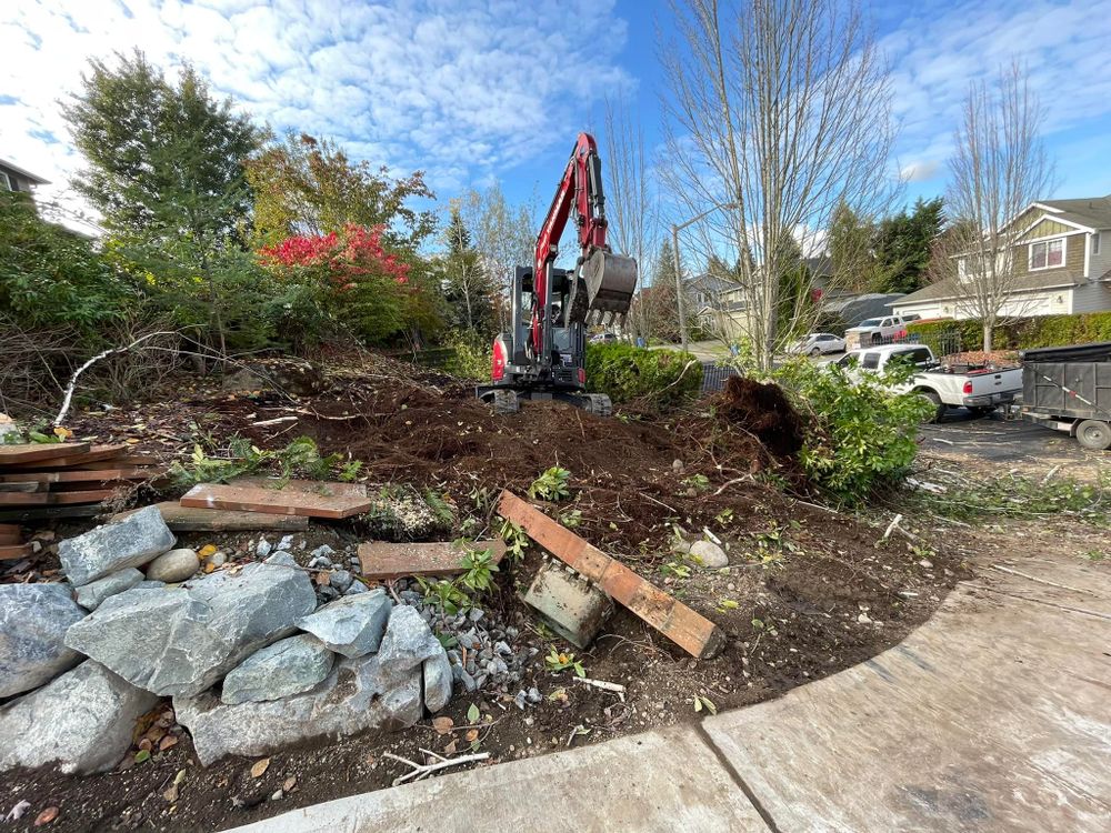 Our Retaining Wall Construction service offers durable and aesthetically pleasing solutions to prevent soil erosion, create level gardens, and enhance your outdoor spaces with expert design tailored to your landscape's unique needs. for Stealth Landscaping in Black Diamond, WA