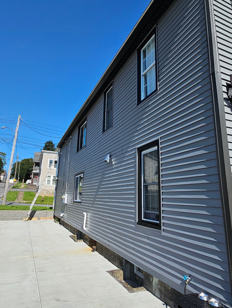 Enhance your home's curb appeal with our vinyl siding house services, offering durability, energy efficiency, and low maintenance. Transform your exterior while protecting against weather elements for lasting beauty and value. for Antonio's Home Improvement in Utica, NY