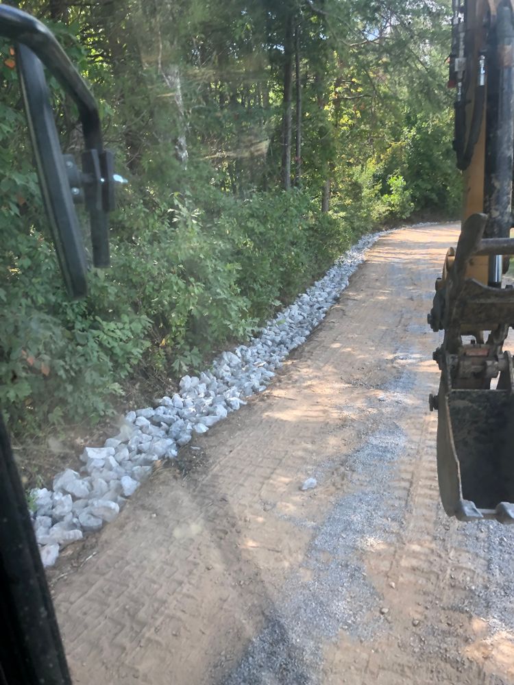 Our driveway construction service ensures durable, aesthetically pleasing results. Specializing in gravel driveway maintenance, we provide expert care and installation to enhance accessibility while prolonging the life of your investment. for Quality Excavating in Seymour, TN