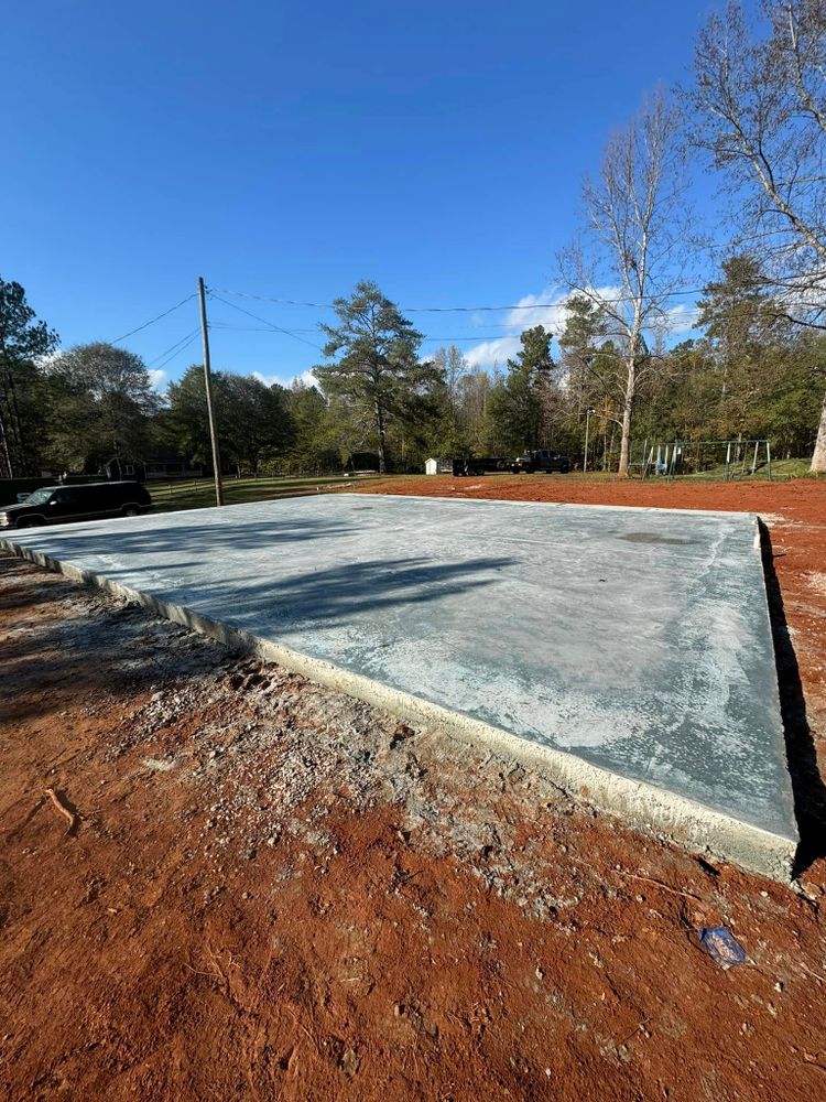 Our concrete services provide durable, expertly crafted concrete slabs ideal for driveways, patios, and foundations. Our team ensures precision and quality to enhance your home's durability and aesthetic appeal. for Good Hope Concrete in Monroe, GA