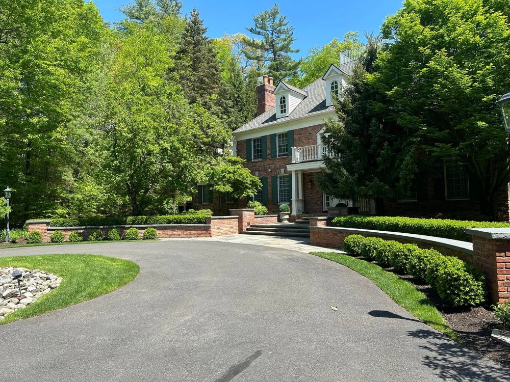 Our driveway repair service restores cracked, uneven, and damaged surfaces, improving safety, appearance and durability. We deliver reliable workmanship and lasting results that protect your investment and enhance your home's curb appeal. for Extreme Paving & Construction in Schenectady, NY